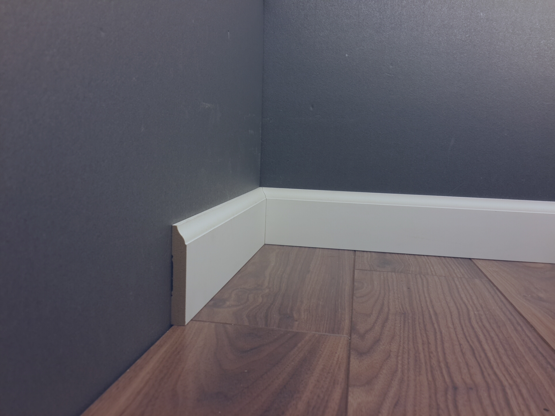 bright skirting board made of wood in the interior of the room