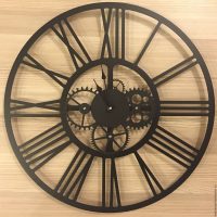 wooden clock in the hallway in the country style photo