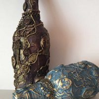 the idea of the original decoration of glass bottles of leather with their own hands photo