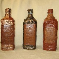 the idea of brightly decorating glass bottles of leather with your own hands picture