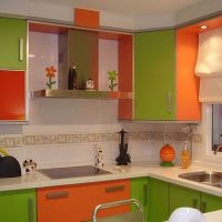 combination of bright orange in the design of the kitchen with other colors picture
