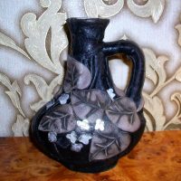 do-it-yourself idea of a bright decor of bottles made of leather