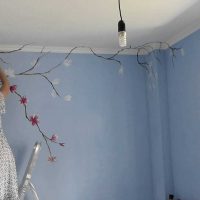 the idea of ​​the original interior of the room with a decorative pattern on the wall photo