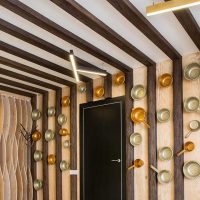 the idea of ​​the original decor of the living room with decorative beams photo