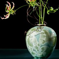 variant of the bright interior of a floor vase with decorative branches photo