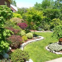 idea of unusual design of the courtyard of a private house photo