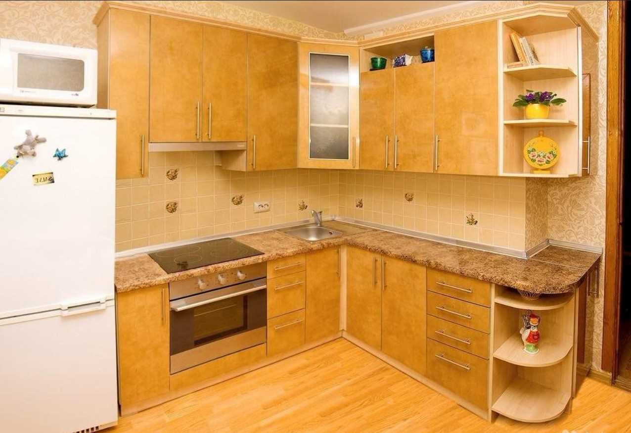 the idea of an unusual design of a kitchen of 9 sq.m