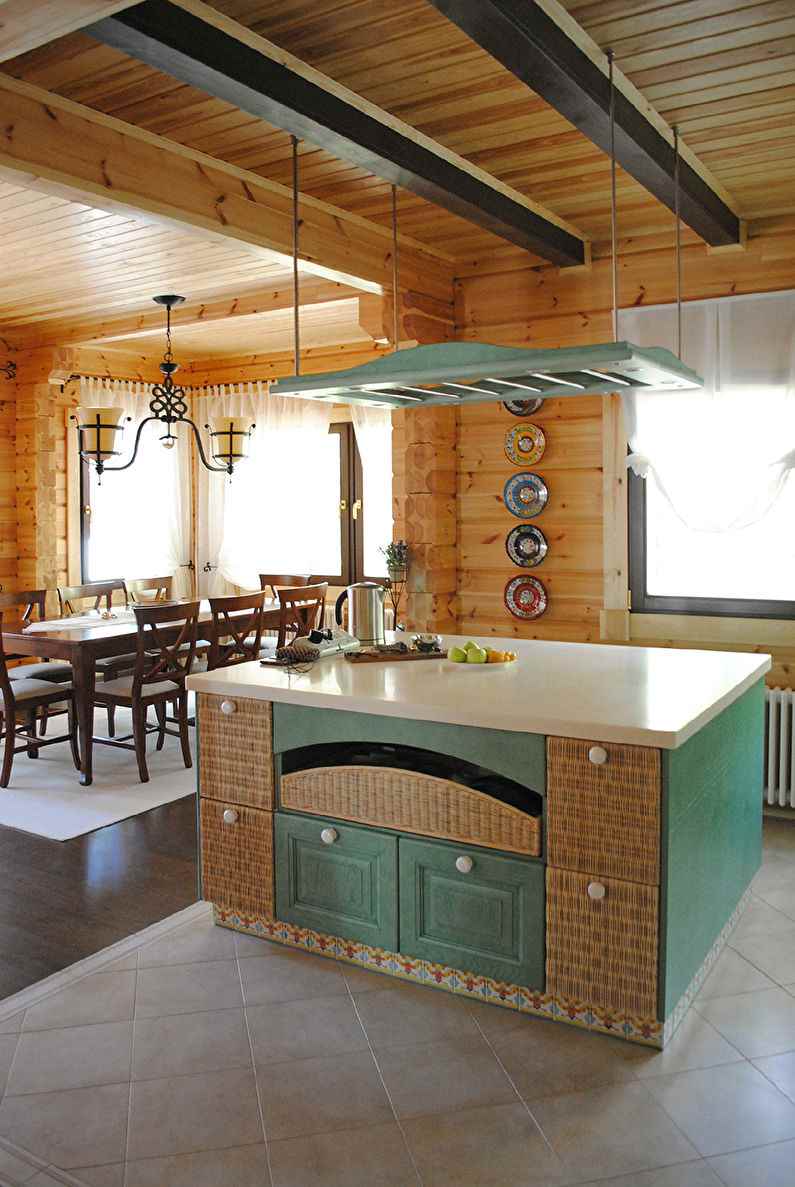 the idea of a bright decor of the kitchen in a wooden house