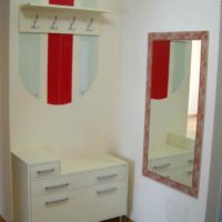 An example of bright design of a small hallway photo