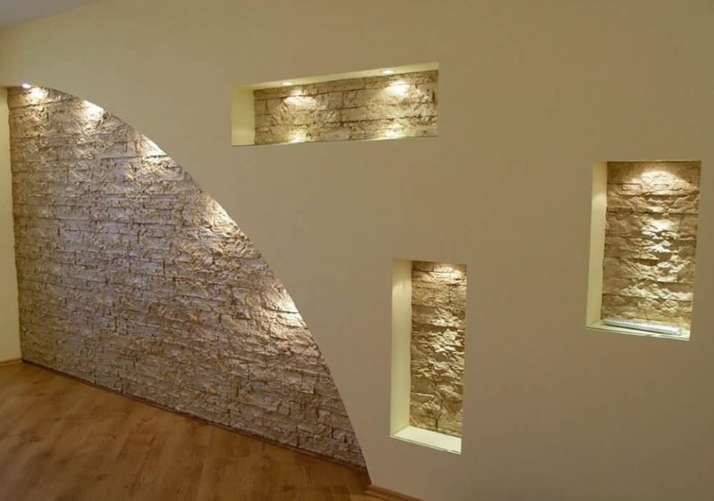 Niches in the hall with decorative stone trim