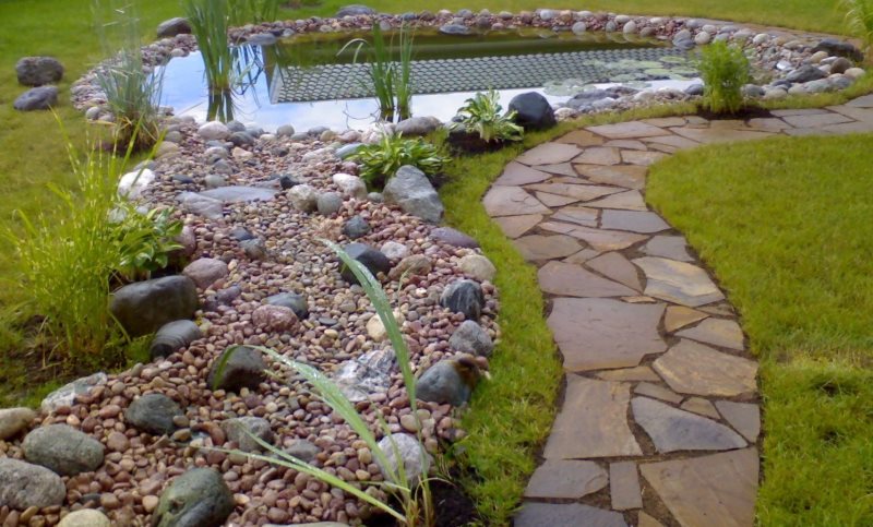 Path to a pond made of natural stone