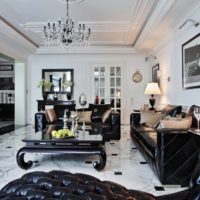 Black furniture in a white living room