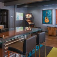 The interior of the living room of a private house with wallpaper for painting
