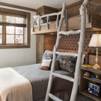 Ladder made of wood on the second tier of the crib
