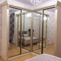 L-shaped wardrobe in the corner of the bedroom