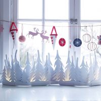 Garland in the window opening of a country house