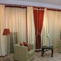 Two armchairs with striped upholstery