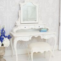 White bent-leg dressing table