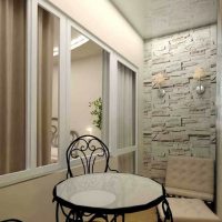 Finishing the end wall of the balcony with decorative stone