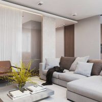 Canapé d'angle au centre de la cuisine-salon