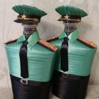 Two bottles in satin ribbons