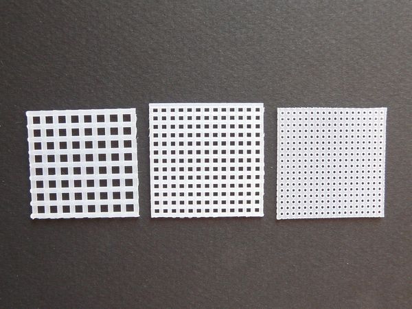 White plastic canvas on gray background