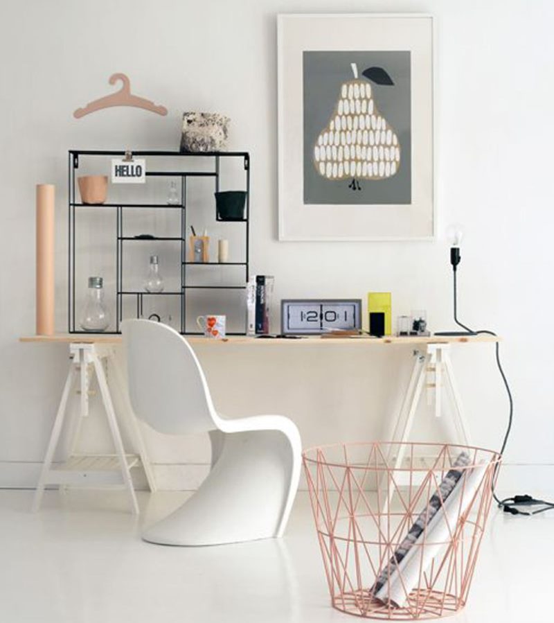 Desk along a white wall