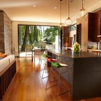 Wooden floor in the spacious kitchen-living room