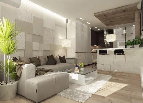 Les experts recommandent de ne pas avoir peur de connecter le salon à la cuisine, car c’est parfois la seule option pour agrandir la zone.